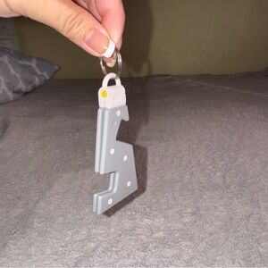 IKEA phone case stand keychain that looks like a step stool